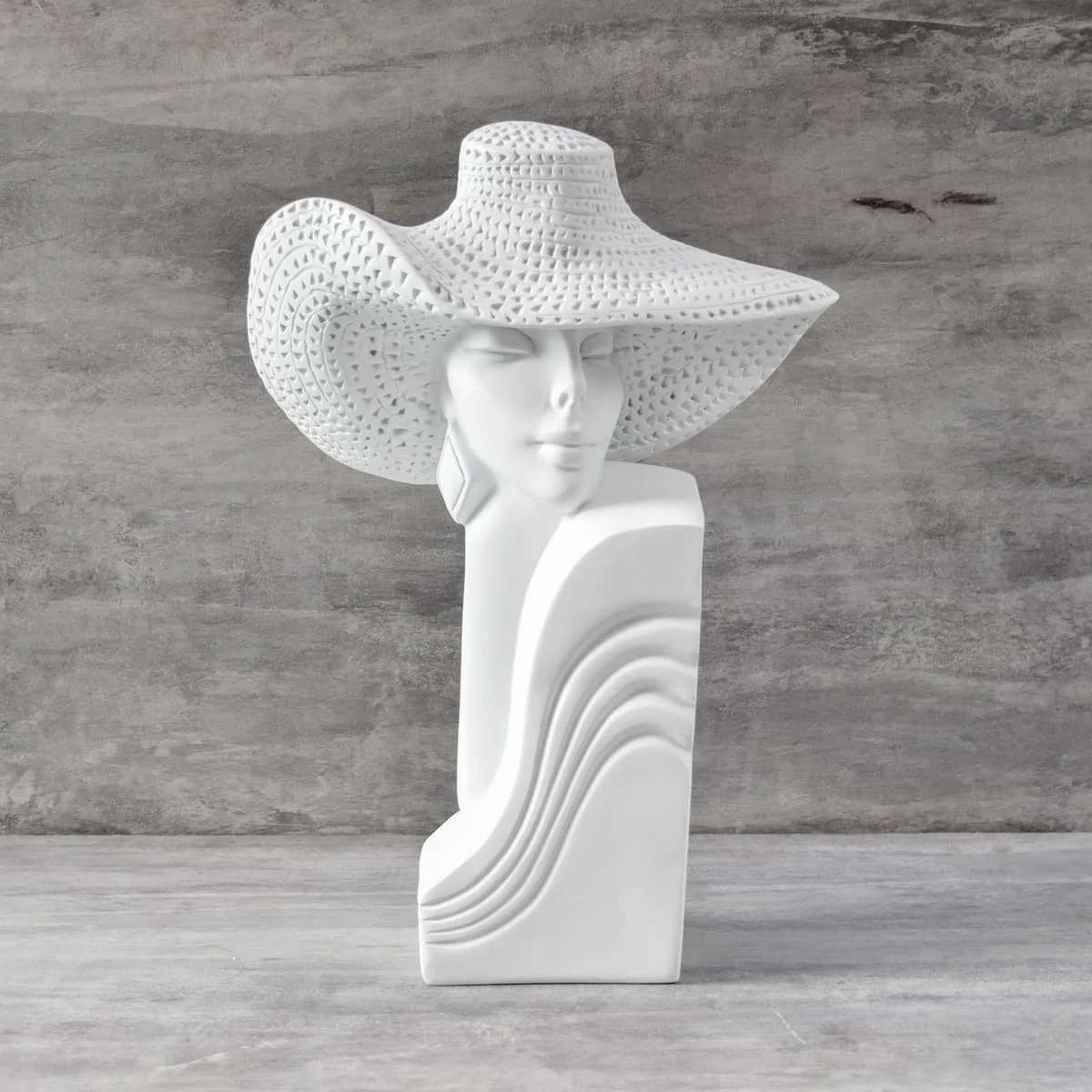 Dakota with a Hat Sculpture