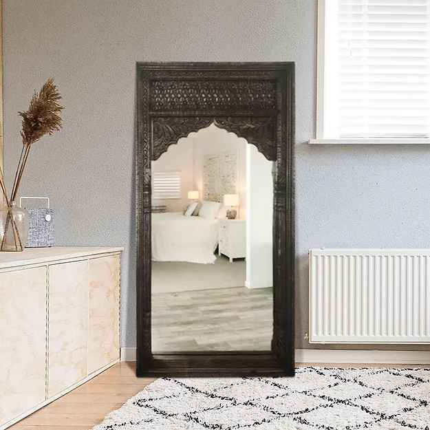 The Nartaka Black Spindle Wall Mirror